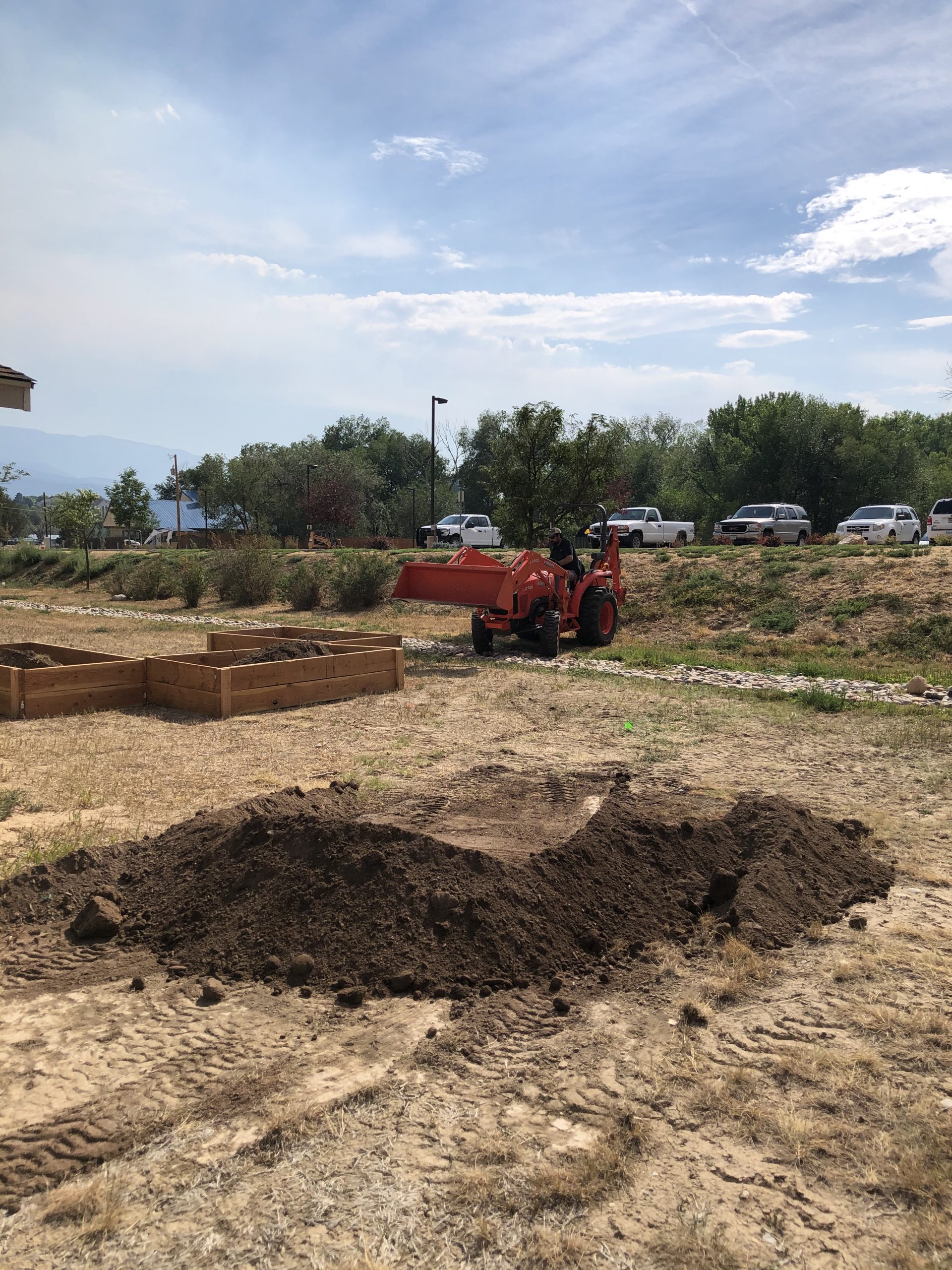 tractor hauling dirt