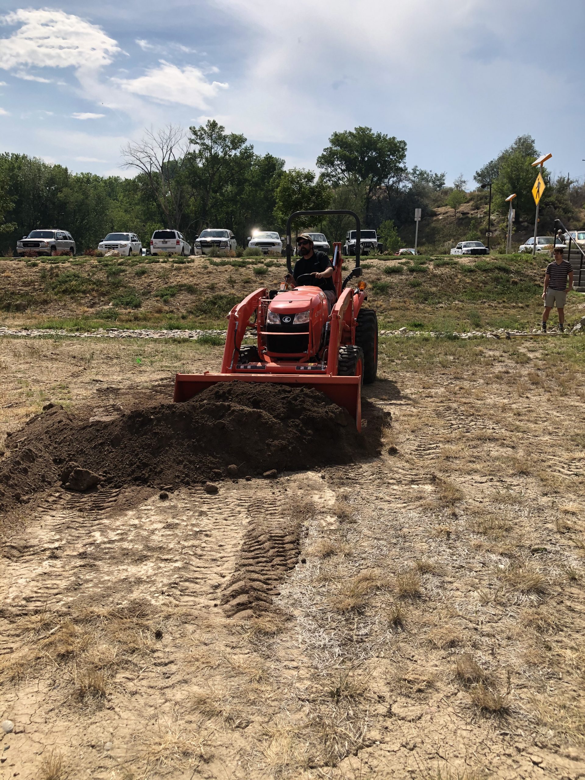 tractor hauling dirt
